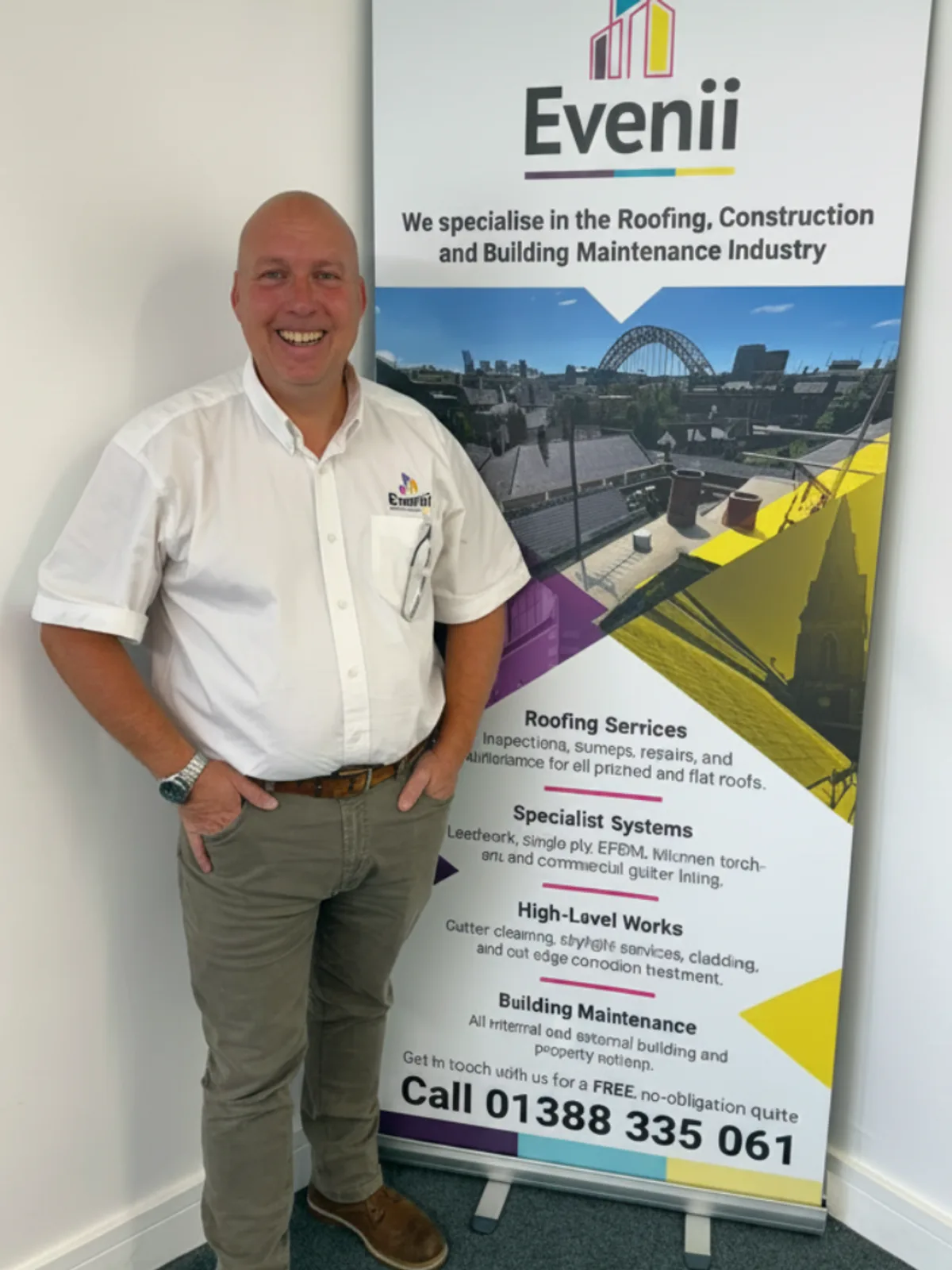 Dean Goyns, operational lead at Evenii, beside a branded Evenii roll-up banner